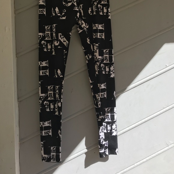 NWOT BLACK WHITE LETTER LEGGINGS - Picture 2 of 2